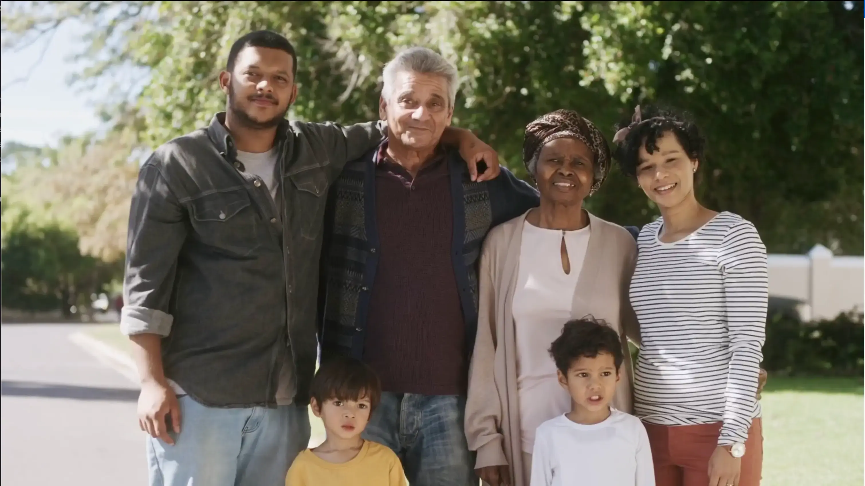 Family posing together outdoors