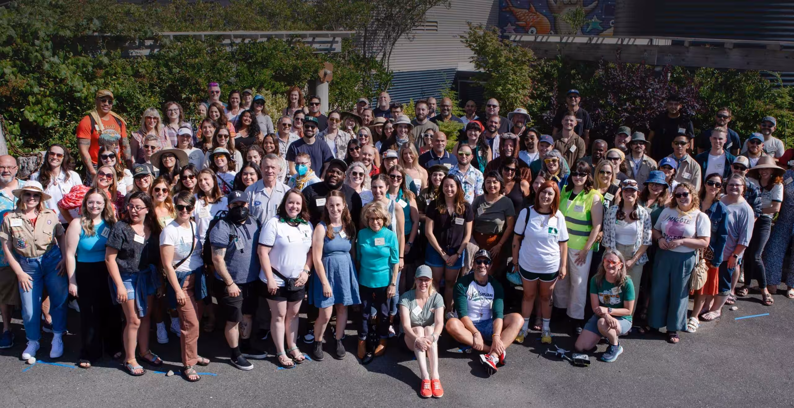 A group photo of people outdoors.