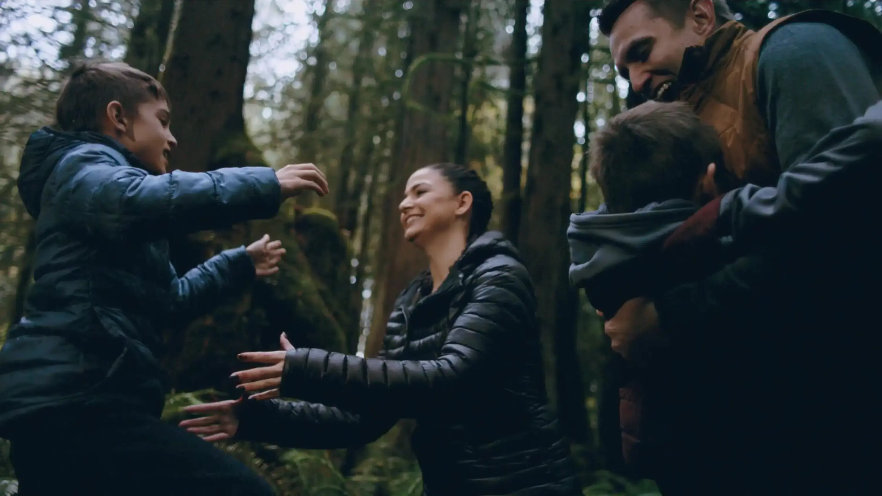 Family participating in salmon conservation